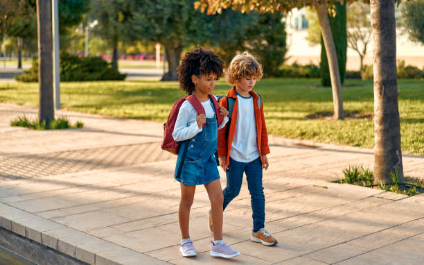 istock School children on the street 1447616936