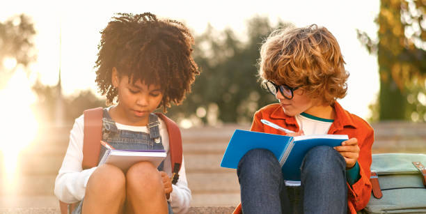istock School children on the street 1447617119