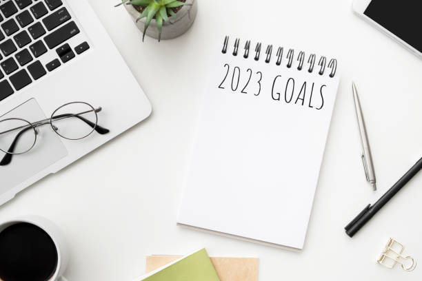 istock Notebook with 2023 goals text on it to apply new year resolutions and plan. 1447617941