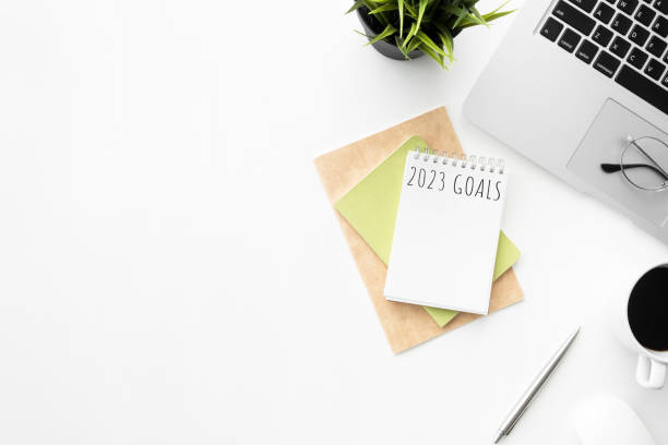 istock Notebook with 2023 goals text on it to apply new year resolutions and plan. 1447617979