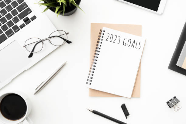 istock Notebook with 2023 goals text on it to apply new year resolutions and plan. 1447617989