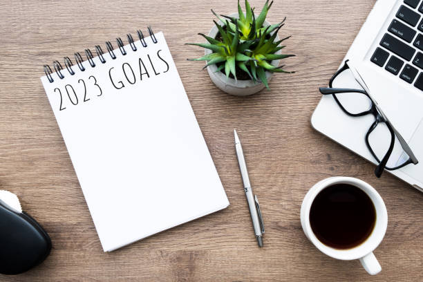 istock Notebook with 2023 goals text on it to apply new year resolutions and plan. 1447618256