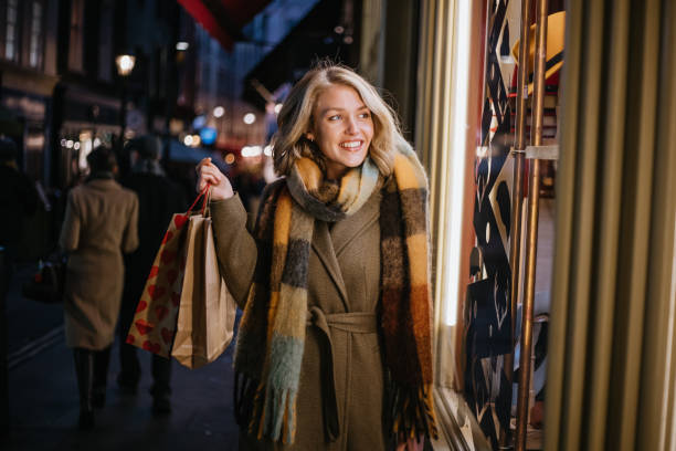 istock Woman Christmas shopping 1447620481