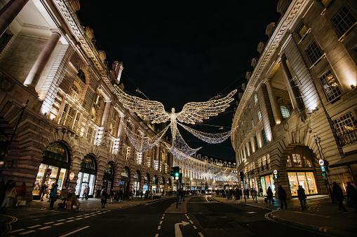 London, United Kingdom - Winter decorations on Regent Street at night.