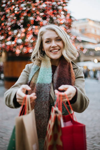 istock Woman Christmas shopping 1447620796