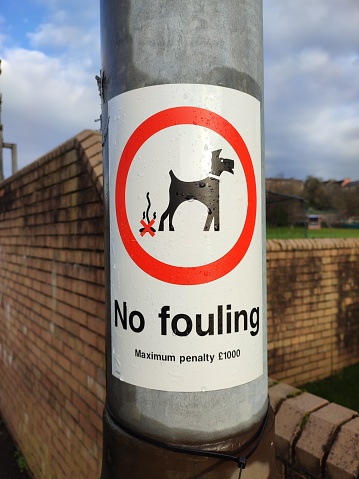 No fouling sign for dog walkers at street of glasgow scotland england uk