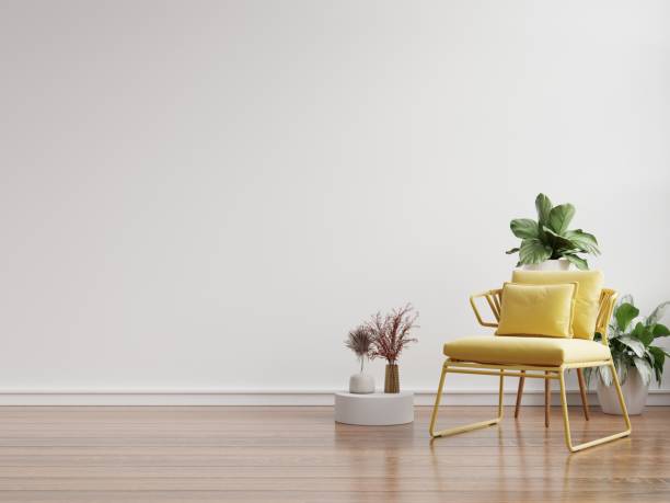 istock Living room has yellow armchair on empty white wall background. 1447623026
