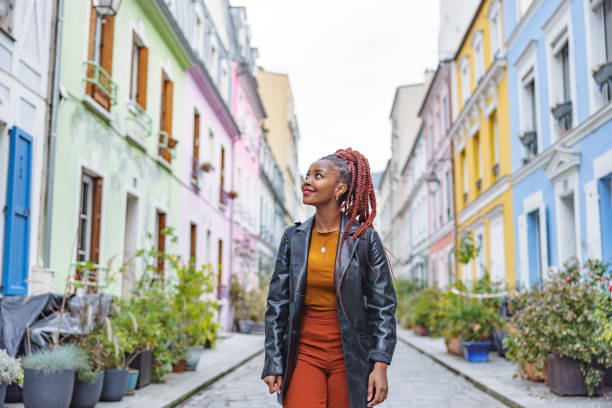 istock Good Looking Dark-Skinned Woman Walking And Sightseeing 1447623231