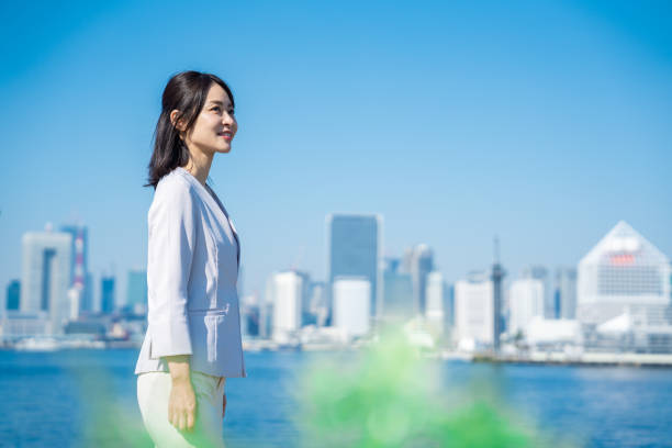 istock Career woman looking up to the future 1447623559