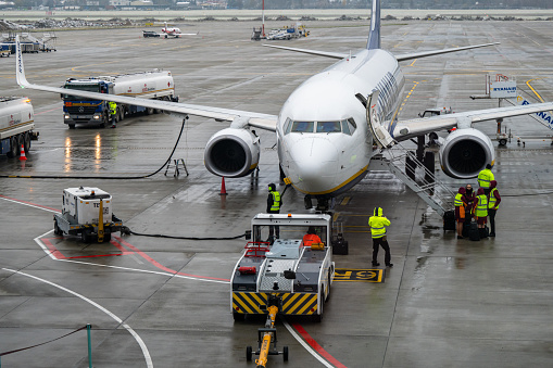 Krakow, Poland - November 18, 2022: Ryanair Boeing 737 is being prepared after one flight to another at the International John Paul II Krakow-Balice Airport.