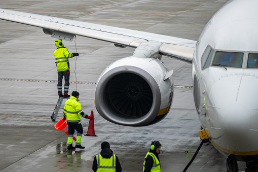 Krakow, Poland - November 18, 2022: Ryanair Boeing 737 is being prepared after one flight to another at the International John Paul II Krakow-Balice Airport.