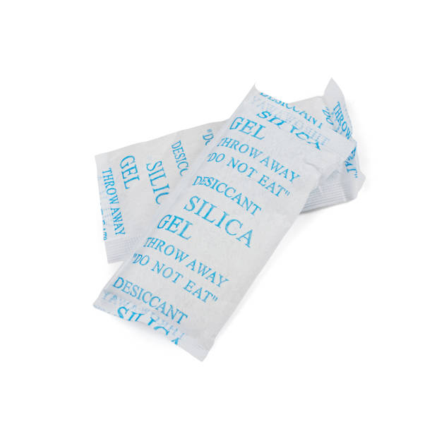 istock Desiccant Silica Gel Adsorbent Sachet Isolated, Desiccant Polymer Bag, Silicagel, Clipping Path 1447628202