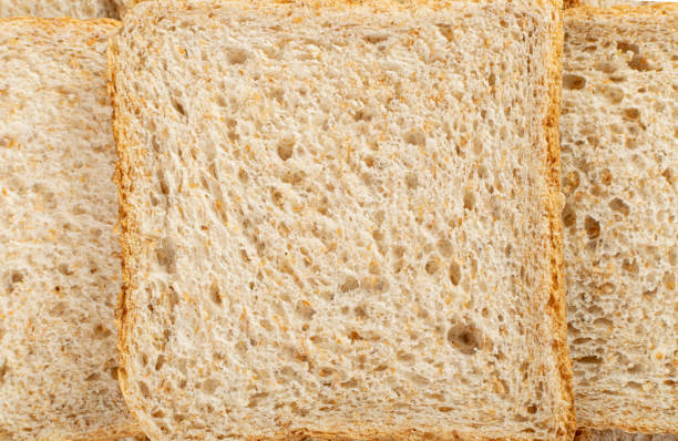 istock Whole Grain Healthy Sandwich Bread Texture Background Top View, Pattern of Brown Organic Cereal Bread 1447628335