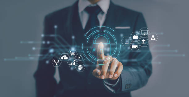 istock Asian businessman touching hologram button icon locked data blurred backbround. 1447629443