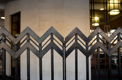 metal frames at fence of wall in street of london england uk