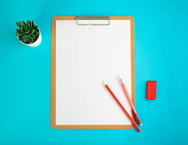 istock Blank Paper Tablet Top View, Empty White Sheet on Blue Table Flat Lay Mockup, Paper Tablet Texture Background 1447633893