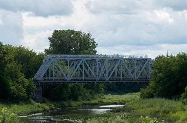istock View of the steel railway bridge over a small river 1447638012