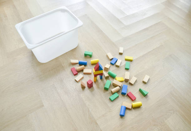 istock Toy blocks scattered on the floor left untidy 1447639488