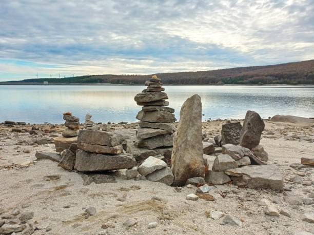 istock Cairn above a lake 1447639540