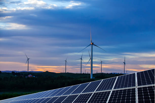 istock Solar photovoltaic panels and wind turbines 1447639657