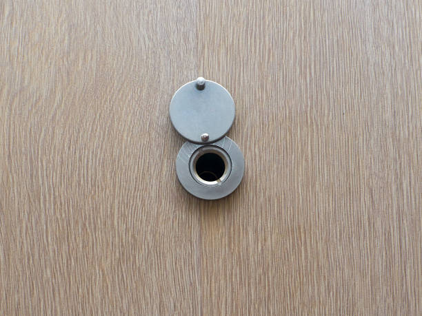 istock Spyhole of a door 1447649473