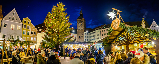 Landsberg am Lech, Germany - December 7: typical sales booth at the annual christmas market in the old town of Landsberg am Lech on December 7, 2022
