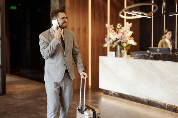 istock Setting up appointments from the hotel lobby 1447650417