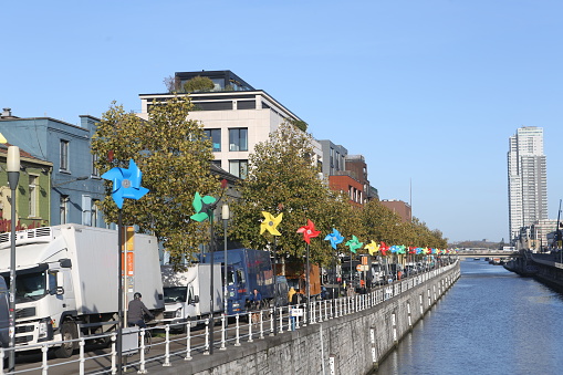 colorfull decorative wind mills at street near bassin vergote of brussels belgium