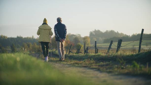 istock Loving elderly couple on a walk. Nordic walking 1447662135
