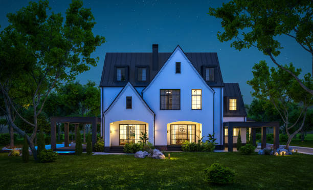 istock 3d rendering of white and black modern Tudor house in night 1447664706