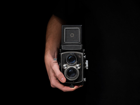 Rangefinder 35mm film photo camera isolated on white