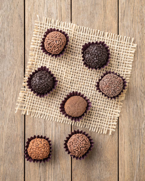 istock Typical brazilian brigadeiros, various flavors over wooden table 1447666569