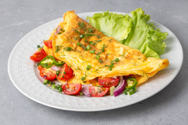 istock Delicious veggie omelet served on a plate 1447667528