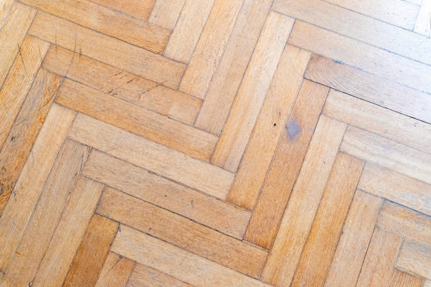 istock Vintage yellow parquet. Texture background full frame, top view, backdrop, old floor 1447671326