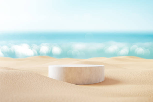 istock 3D podium with copy space for product display presentation on beach with blue sky and white clouds abstract background. Tropical summer and vacation concept. 1447671413