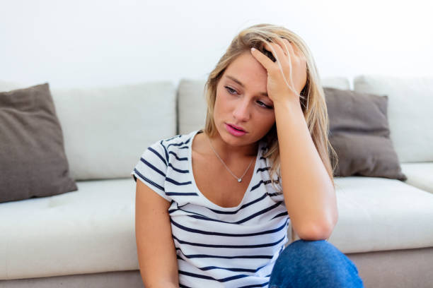 depressed upset young woman feeling hurt sad stressed troubled with unwanted pregnancy, regret mistake abortion, having headache or drug addiction, suffer from grief dramatic bad problem concept. - guilt imagens e fotografias de stock