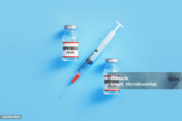 Diphtheria Vaccine And Syringe Forming Percentage Sign On Blue Background Stock Photo - Download Image Now