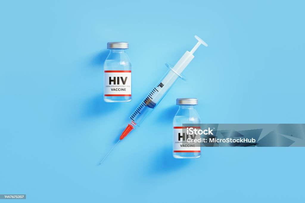 HIV Vaccine and Syringe Forming Percentage Sign on Blue Background HIV vaccines and syringe forming percentage sign on blue background, Horizontal composition with copy space. Vaccine efficacy concept. AIDS Stock Photo