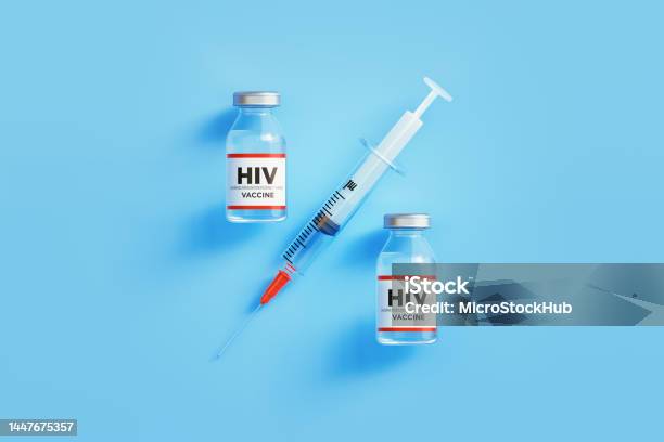 Hiv Vaccine And Syringe Forming Percentage Sign On Blue Background Stock Photo - Download Image Now