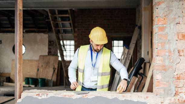 istock Construction, building manager man and handyman contractor measure on architect project. Industrial, engineer or construction worker planning and working on architecture design and builder logistics 1447680245