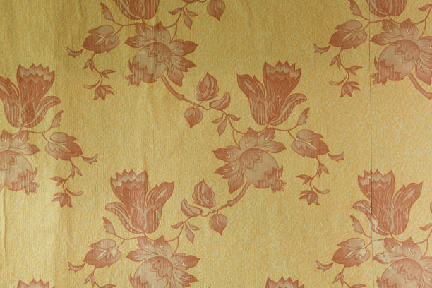 istock Old wallpaper on the wall. Old wallpaper for texture or background. 1447683894