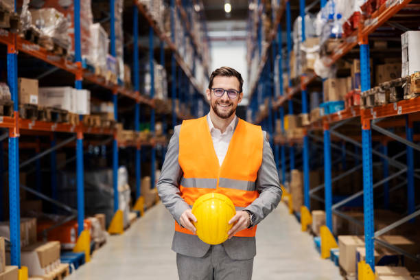 istock A successful businessman posing in storage. 1447687411