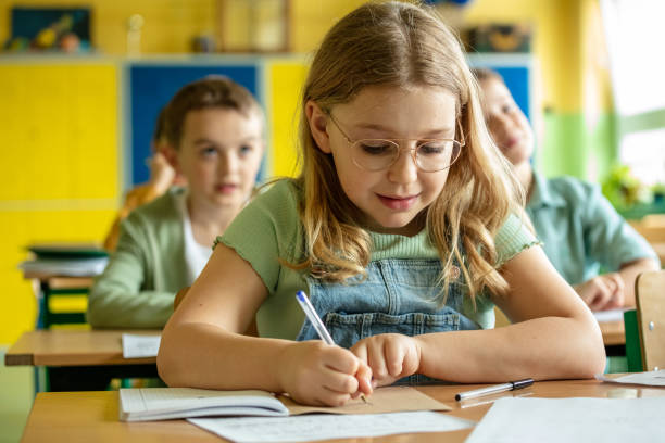 istock School children learning in the classroom 1447688475