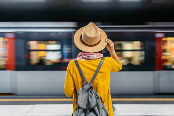 istock Young Woman Waiting For A Subway Train In Milan 1447695804