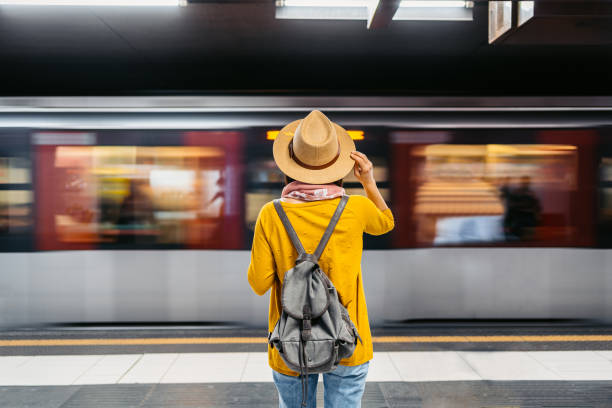 istock Young Woman Waiting For A Subway Train In Milan 1447695879