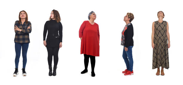 istock group of woman looking up on white background 1447695885