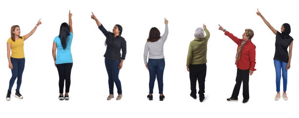 istock group of woman pointing on white background 1447695914