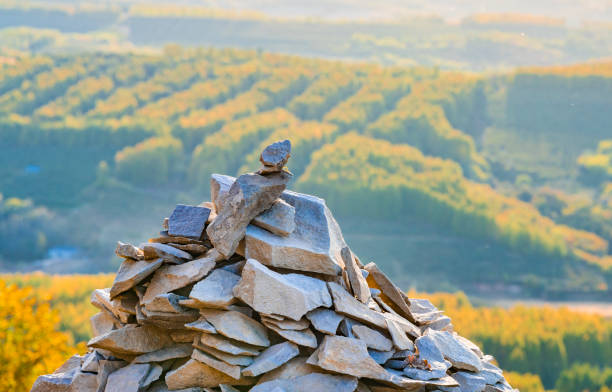 A small pile of stones at sunset