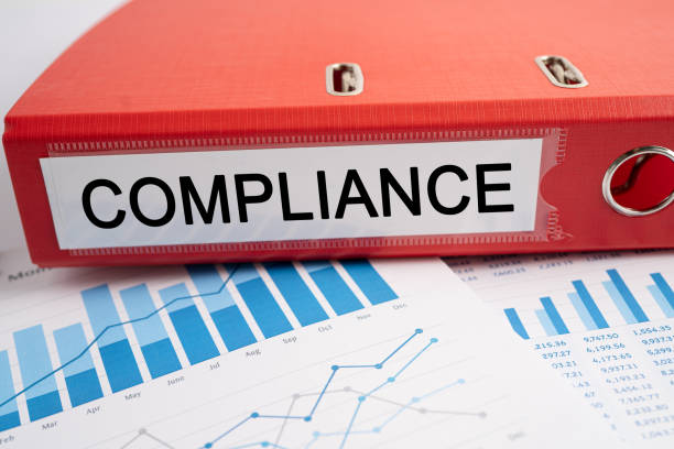 istock Compliance. Binder data finance report business with graph analysis in office. 1447698909