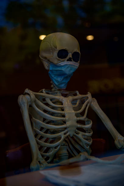 istock Skelton wearing a mask 1447702730